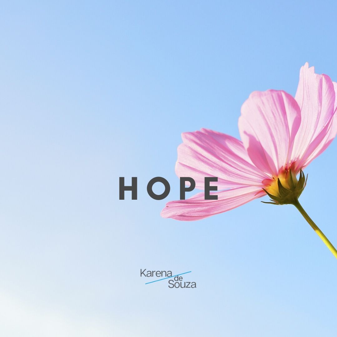 The title HOPE written. Background photo is a pink daisy against a light sky blue background